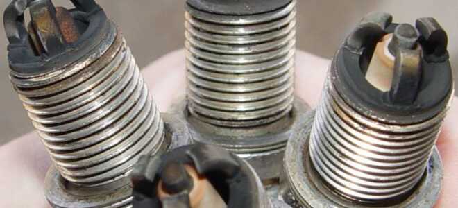 Почему появился черный нагар на свечах зажигания?